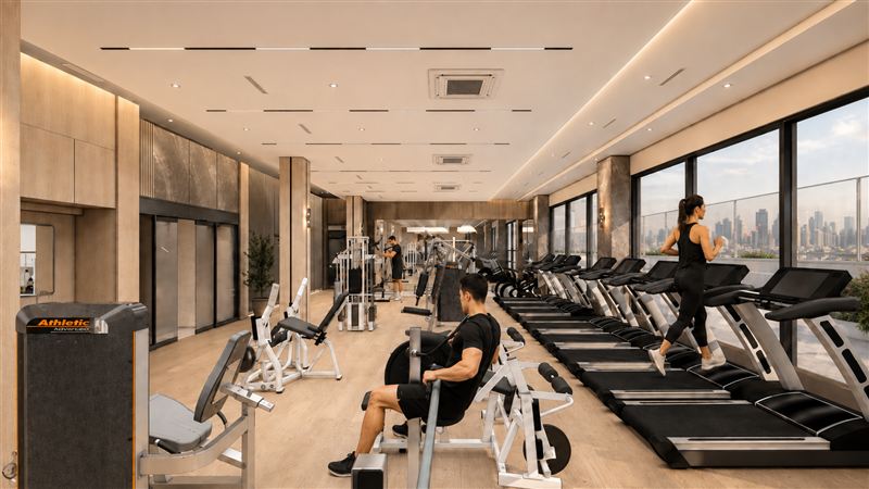 단지 내 헬스장 – 러닝머신과 웨이트 기구, 통창 전망
